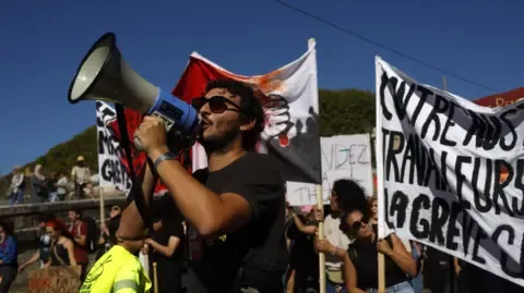 France-Wide Walkouts Erupt Against Spending Slashing